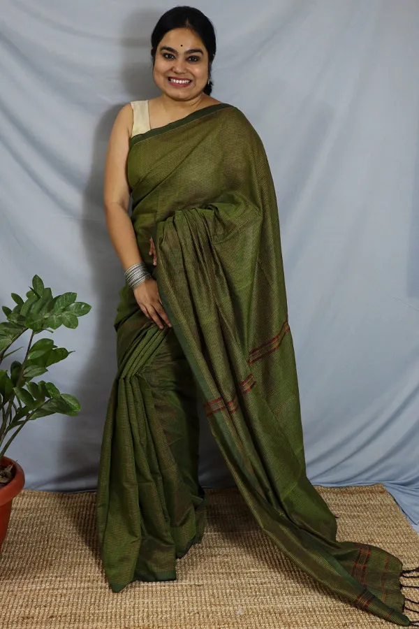 White and Yellow  Dola Silk Saree Decked Up with Vertical Zari Stripes All Over the Body, Complemented by a Contrast Border of Traditional Zari Designs, Self-Pallu of Stripes, and Paired with a Contrast Blouse