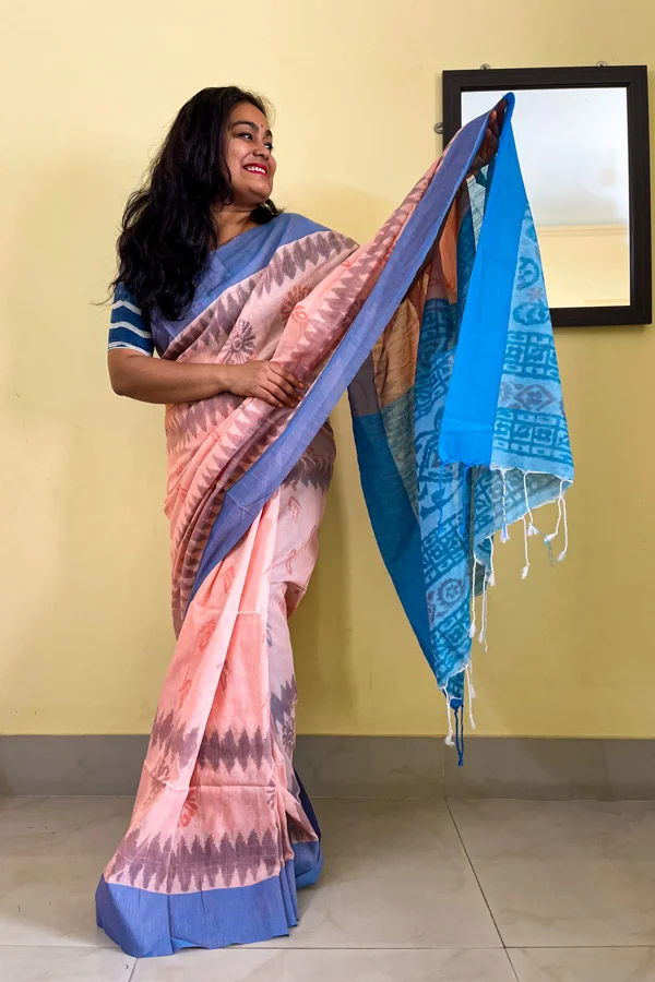 Peach Sambalpuri Printed Soft Cotton Saree with Blue Border (4) Peach Sambalpuri Printed Soft Cotton Saree with Blue Border (2)